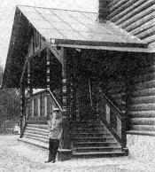 V.P. Alyshkov near the buiding of the Church of the Kazan Icon of the Mother of God in Vyritsa Town. Photograph of 1914