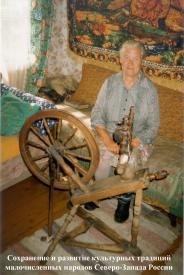 Ingermanland Finnish woman   from Vybye Village  with the traditional spinning wheel