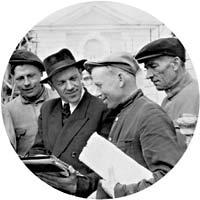 V.M. Savkov (2nd left) and the group of workers near the Grand Peterhof Palace. Photograph of 1951